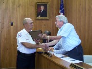 Mayor Albright presented Fireman Doug Brakefield with a proclamation declaring August as Firefighter Month